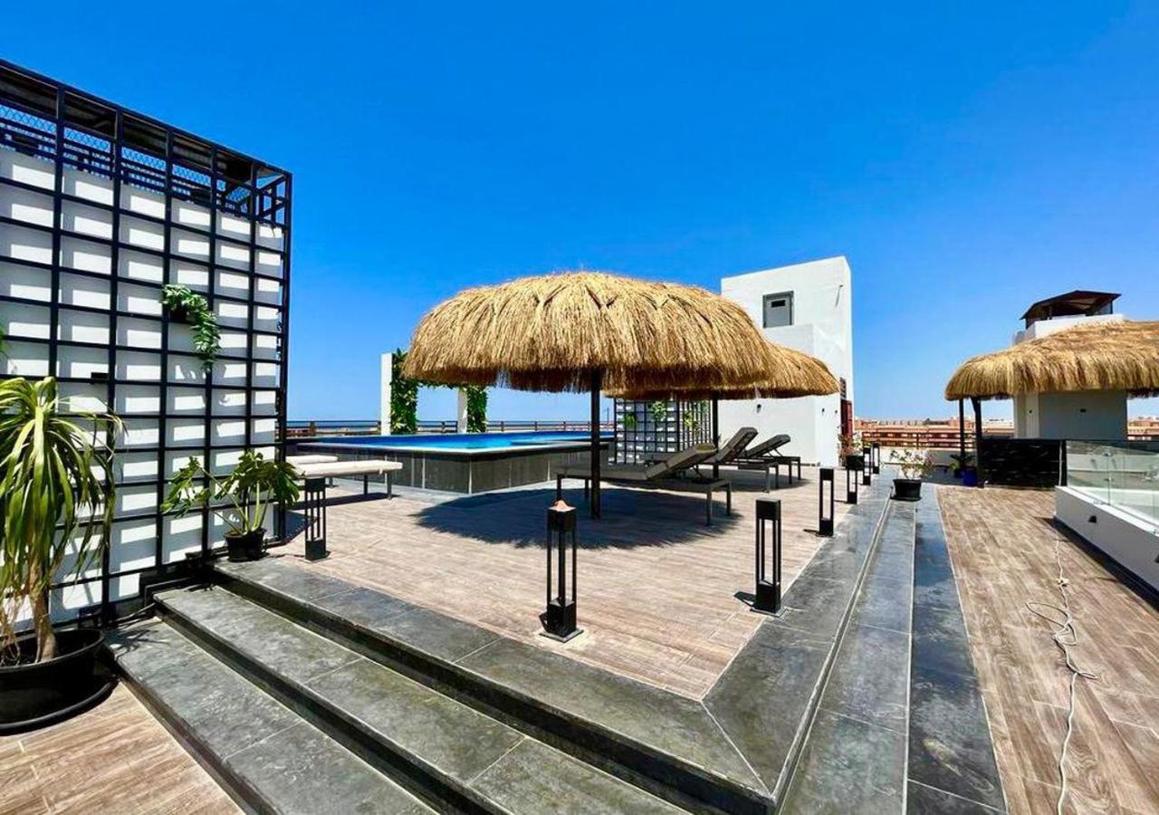 Sanctuary Sunlit Hurghada Haven With 4 Pools, Rooftop Sunsets & Gourmet Bites Steps Away Ngoại thất bức ảnh