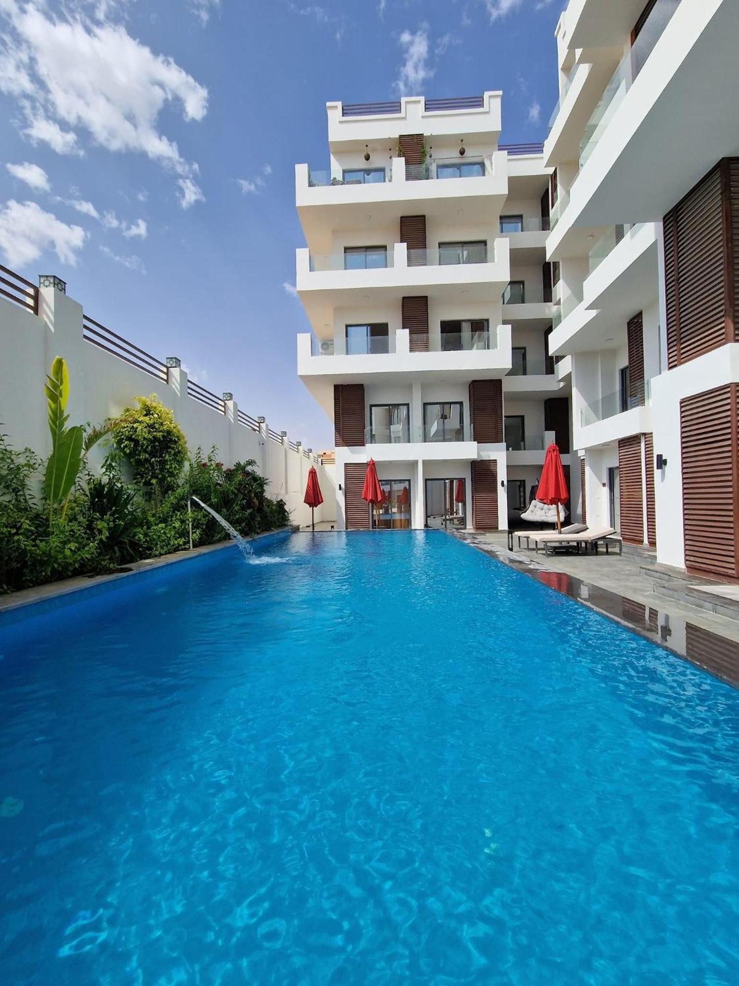 Sanctuary Sunlit Hurghada Haven With 4 Pools, Rooftop Sunsets & Gourmet Bites Steps Away Ngoại thất bức ảnh